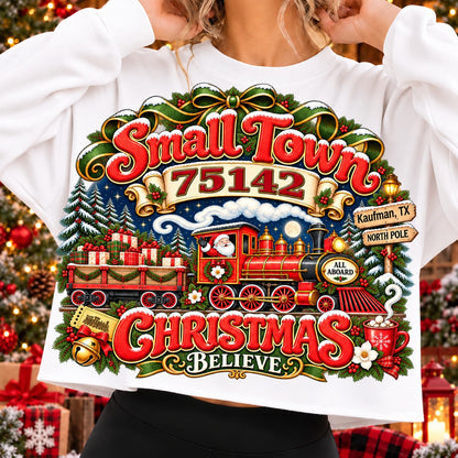 Small Town 75142 Christmas Believe sweatshirt on White, Santa steam train, gifts, snowy pines and Kaufman, TX signpost (kaufman-tx-75142)