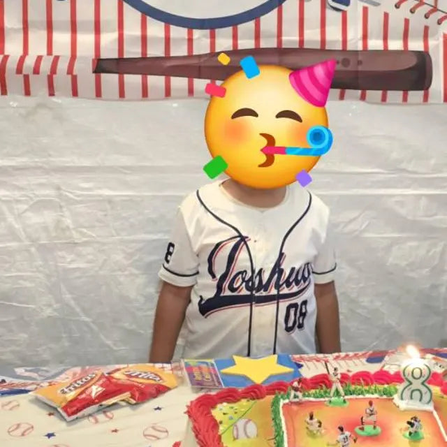 Child celebrating in a custom baseball jersey
